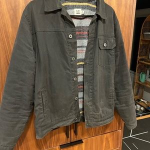 Flint and Tinder
Flannel-lined Waxed Trucker Jacket